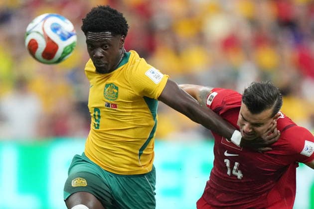 June 13, 2026, Vancouver, Bc, CANADA: Australia s Mohamed Toure (9) and Turkey s Abdulkerim BardakcÄÂ± (14) vie for the ball during the first half of a World Cup Group D soccer match, in Vancouver, on Saturday, June 13, 2026. Canada News - June 13, 2026  - ZUMAc35_ 20260613_zaf_c35_208 Copyright: xDarrylxDyckx
