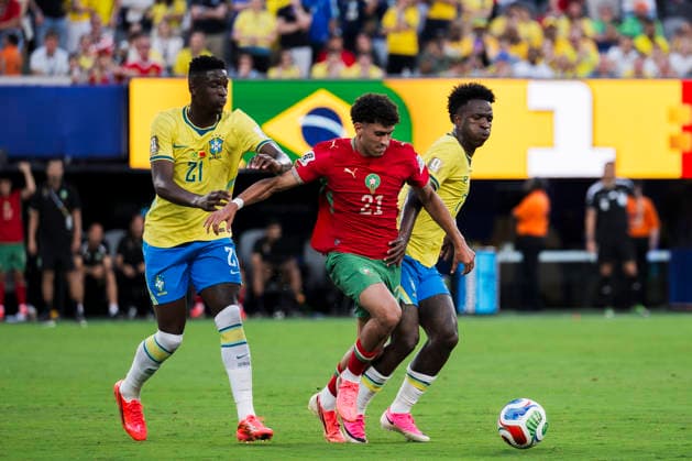 Brazil v Morocco - FIFA World Cup, WM, Weltmeisterschaft, Fussball 2026 Ayoube Amaimouni of Morocco competes for the ball with Luiz Henrique and Vinicius Junior of Brazil during the FIFA World Cup 2026 Group C football match between Brazil and Morocco. East Rutherford United States Copyright: xNicolòxCampox