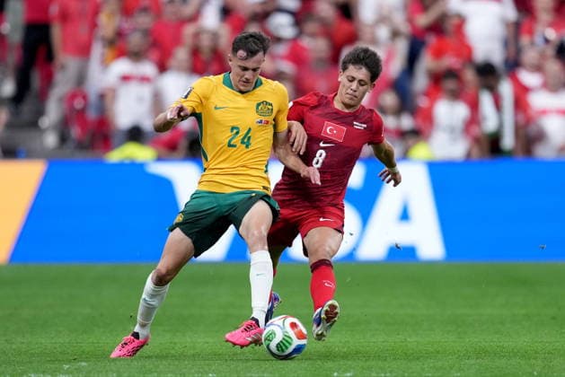 June 13, 2026, Vancouver, Bc, CANADA: Turkey s Arda Guler (8) and Australia s Paul Okon-Engstler (24) vie for the ball during first half group D World Cup soccer action, in Vancouver, Saturday, June 13, 2026. AUSTRALIA V. TURKEY  - ZUMAc35_ 20260613_zaf_c35_213 Copyright: xEthanxCairnsx