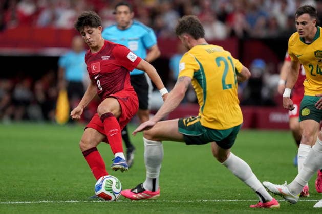 June 13, 2026, Vancouver, Bc, CANADA: Turkey s Arda Guler (8) and Australia s Cameron Burgess (21) vie for control of the ball during first half group D World Cup soccer action, in Vancouver, Saturday, June 13, 2026. AUSTRALIA V. TURKEY  - ZUMAc35_ 20260613_zaf_c35_215 Copyright: xEthanxCairnsx