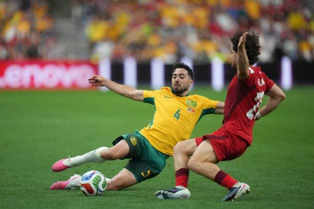 June 13, 2026, Vancouver, Bc, CANADA: Australia s Jacob Italiano (4) and Turkey s Ferdi KadÄÂ±oglu (20) collide during the first half of a World Cup Group D soccer match, in Vancouver, on Saturday, June 13, 2026. Canada News - June 13, 2026  - ZUMAc35_ 20260613_zaf_c35_224 Copyright: xDarrylxDyckx