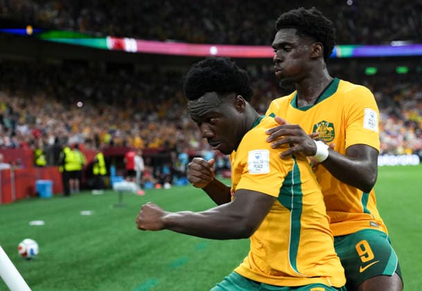 (260614) -- VANCOUVER, June 14, 2026 -- Nestory Irankunda (L) of Australia celebrates his score during the group D match between Australia and T¨¹rkiye at the 2026 FIFA World Cup, WM, Weltmeisterschaft, Fussball at BC Place Vancouver in Vancouver, Canada, June 13, 2026. ) (SP)CANADA-VANCOUVER-FOOTBALL-FIFA WORLD CUP-GROUP D-AUS VS TUR MengxYongmin 
