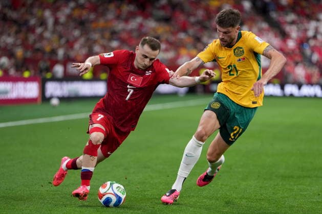 June 13, 2026, Vancouver, Bc, CANADA: Turkey s Muhammed Kerem Akturkoglu (7) and Australia s Cameron Burgess (21) vie for control of the ball during first half group D World Cup soccer action, in Vancouver, Saturday, June 13, 2026. AUSTRALIA V. TURKEY  - ZUMAc35_ 20260613_zaf_c35_227 Copyright: xEthanxCairnsx
