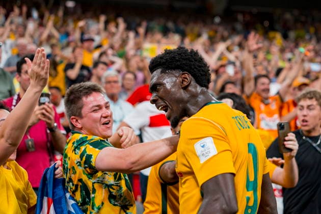 FIFA World Cup, WM, Weltmeisterschaft, Fussball 2026 - Group D - Australia vs Turkey Mohamed Toure of Australia celebrates with fans after a goal scored by Connor Metcalfe in the second half during the FIFA World Cup 2026 group stage match Australia against Turkey, in Vancouver, Canada, 13 June 2026. VANCOUVER Canada  Copyright: xBOBxFRIDx