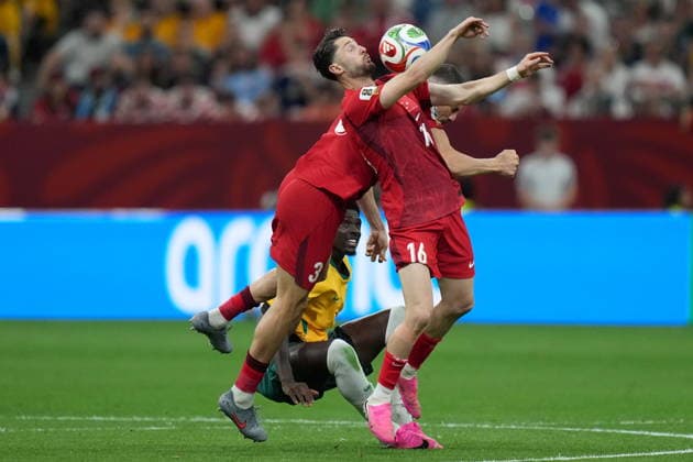 June 13, 2026, Vancouver, Bc, CANADA: Australia s Mohamed Toure (9) looks on as Turkey s Ismail Yuksek (16) and teammate Merih Demiral (3) collide during second half group D World Cup soccer action, in Vancouver, Saturday, June 13, 2026. AUSTRALIA V. TURKEY  - ZUMAc35_ 20260613_zaf_c35_238 Copyright: xDarrylxDyckx