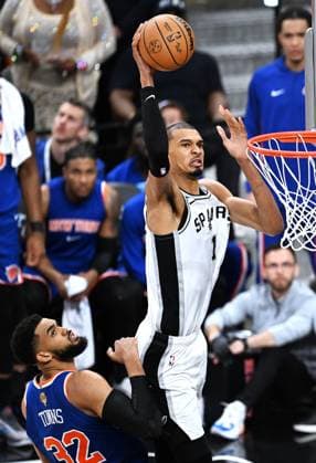 (260614) -- SAN ANTONIO, June 14, 2026 -- Victor Wembanyama (top) of San Antonio Spurs dunks during the final game 5 between New York Knicks and San Antonio Spurs at the 2025-2026 NBA, Basketball Herren, USA basketball game in San Antonio, the United States, June 13, 2026. ) (SP)U.S.-SAN ANTONIO-BASKETBALL-NBA-FINALS-KNICKS VS SPURS WuxXiaoling 