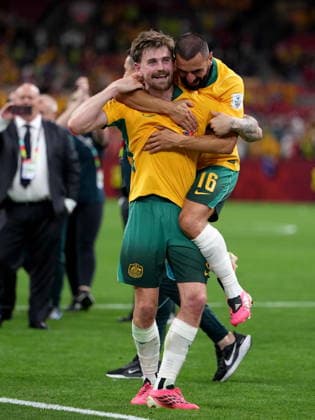 June 14, 2026, Vancouver, Bc, CANADA: Australia s Aziz Behich (16) jumps on teammate Conor Metcalfe (8) as they celebrate the team s 2-0 victory over Turkey in group D World Cup soccer action, in Vancouver, Saturday, June 13, 2026. AUSTRALIA V. TURKEY  - ZUMAc35_ 20260614_zaf_c35_005 Copyright: xEthanxCairnsx