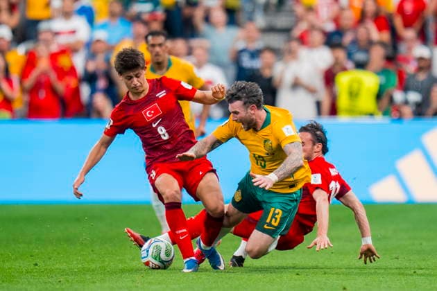 FIFA World Cup, WM, Weltmeisterschaft, Fussball 2026 - Group D - Australia vs Turkey Arda Guler of Turkey tackles Aiden Oneill of Australia in the second half during the FIFA World Cup 2026 group stage match Australia against Turkey, in Vancouver, Canada, 13 June 2026. VANCOUVER Canada  Copyright: xBOBxFRIDx