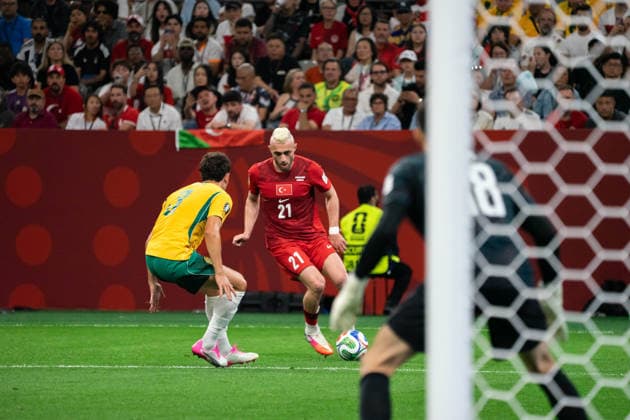 VANCOUVER, CANADA - JUNE 13: Baris Alper Yilmaz of Turkey controls the ball while Alessandro Circati of Australia follow closely during the FIFA World Cup, WM, Weltmeisterschaft, Fussball 2026 group stage match between Australia and Turkey at BC Place Stadium on June 13, 2026 in Vancouver, British Columbia, Canada.  Copyright: xAmyxElle SPPx Sportspressphoto_SPR166202