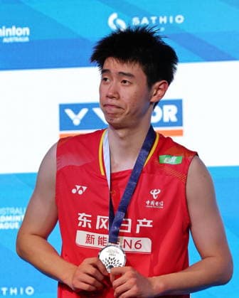 (260614) -- SYDNEY, June 14, 2026 -- Dong Tianyao reacts during the awarding ceremony after the men s singles final between Dong Tianyao of China and Alwi Farhan of Indonesia at the Australian Badminton Open 2026 in Sydney, Australia, June 14, 2026. ) (SP)AUSTRALIA-SYDNEY-BADMINTON-AUSTRALIAN OPEN-MEN S SINGLES-FINAL GongxBing 