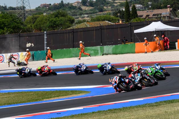 June 14, 2026, Misano Adriatico, Rimini, Italy: Michael VAN DER MARK (NED) riding for ROKiT BMW Motorrad WorldSBK Team at turn 5 during the Superpole Race of 2026 WorldSBK Pirelli Emilia Romagna round 7 at the Misano World Circuit in Misano Adriatico (Rimini, Italy)..In the background the crash of Sam LOWES (GBR) riding for ELF Marc VDS Racing Team at turn 4..Credit: ZUMA Press Motorsports 2026: WorldSBK Misano: SPRINT RACE  - ZUMAr158 20260614_aap_r158_003 Copyright: xRiccardoxRighettix