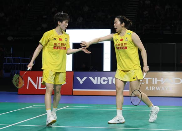(SP)AUSTRALIA-SYDNEY-BADMINTON-AUSTRALIAN OPEN-WOMEN S DOUBLES (260614) -- SYDNEY, June 14, 2026 (Xinhua) -- Jia Yifan (R) Zhang Shuxian celebrate during the women s doubles final match between Jia Yifan Zhang Shuxian of China and Febriana Dwipuji Kusuma Meilysa Trias Puspitasari of Indonesia at the Australian Badminton Open 2026 in Sydney, Australia, June 14, 2026. (Xinhua Gong Bing)