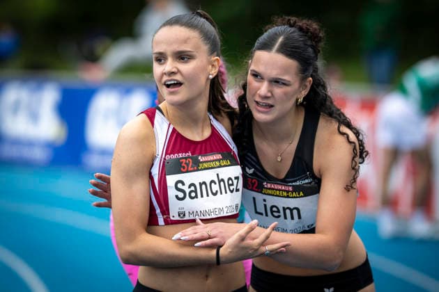 MANNHEIM, GERMANY - JUNE 14, 2026 : Jil Sanchez (SUI Switzerland) and Sereina Liem (SUI Switzerland) after the 100m hurdles final U20 during the Juniorengala 2026 at Michael-Hoffmann-Stadion on June 14, 2026 in Mannheim, Germany. Baden-Wuerttemberg Germany Copyright: xAxelxKohringx