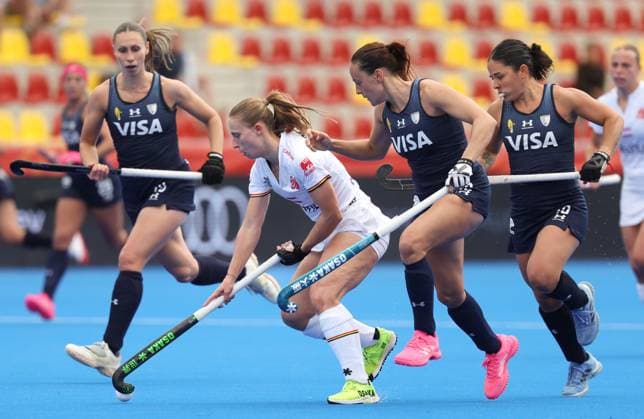 Belgium s Justine Rasir fights for the ball during a hockey game between Belgian national team, Nationalteam Red Panthers and Argentina, Sunday 14 June 2026 in Wavre, match 9 16 in the group stage of the women s FIH Pro League competition. VIRGINIExLEFOUR  x177613537x