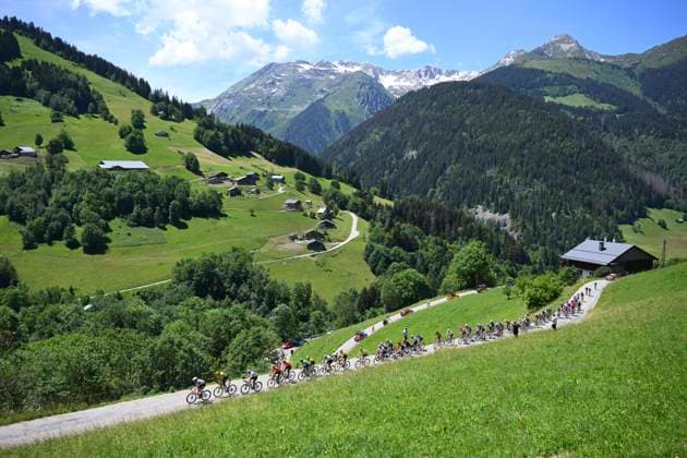 Tour Auvergne - Rhone-Alpes 2026 Stage 8 PLATEAU DE SOLAISON - BRISON, FRANCE - JUNE 14 : illustration picture peloton during stage 8 of the 78th edition of Tour Auvergne - Rhone-Alpes an UCI World Tour 2.UWT cycling road race stage for Men Elite of 120.1 km with start in Beaufort and finish in Plateau de Solaison - Brison on June 14, 2026 in Plateau de Solaison - Brison, France, 14 06 2026 ( Motordriver Guy De Vuyst - Plateau de Solaison - Brison France  Copyright: xVincentxKalutx