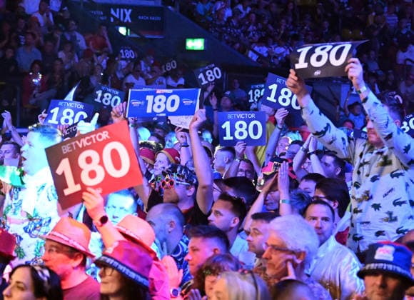 14.06.2026, xhbx, Dart World Cup of Darts 2026, v.l. Dart Fans, Zuschauer, Stimmung, Verkleidung, Kostüme, Schild 180 (DFL DFB REGULATIONS PROHIBIT ANY USE OF PHOTOGRAPHS as IMAGE SEQUENCES and or QUASI-VIDEO) Frankfurt