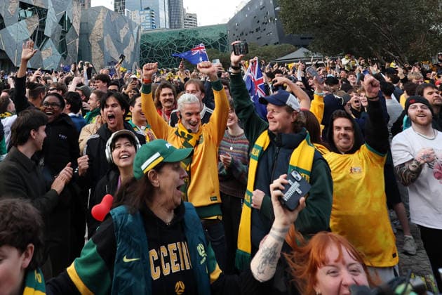 WORLD CUP LIVE SITE, Craig Foster (centre) is seen with fans celebrating the Socceroos win while watching the FIFA World Cup, WM, Weltmeisterschaft, Fussball Group D Australia versus TuÌˆrkiye match live site at Federation Square in Melbourne, Sunday, June 14, 2026. ( NO ARCHIVING Melbourne Victoria Australia  Copyright: xConxChronisx 20260614176197894516