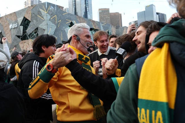 WORLD CUP LIVE SITE, Craig Foster (centre) is seen with fans celebrating the Socceroos win while watching the FIFA World Cup, WM, Weltmeisterschaft, Fussball Group D Australia versus TuÌˆrkiye match live site at Federation Square in Melbourne, Sunday, June 14, 2026. ( NO ARCHIVING Melbourne Victoria Australia  Copyright: xConxChronisx 20260614178700402546