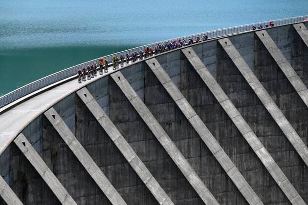 Tour Auvergne - Rhone-Alpes 2026 Stage 8 PLATEAU DE SOLAISON - BRISON, FRANCE - JUNE 14 : illustration picture peloton during stage 8 of the 78th edition of Tour Auvergne - Rhone-Alpes an UCI World Tour 2.UWT cycling road race stage for Men Elite of 120.1 km with start in Beaufort and finish in Plateau de Solaison - Brison on June 14, 2026 in Plateau de Solaison - Brison, France, 14 06 2026 ( Motordriver Guy De Vuyst - Plateau de Solaison - Brison France  Copyright: xVincentxKalutx