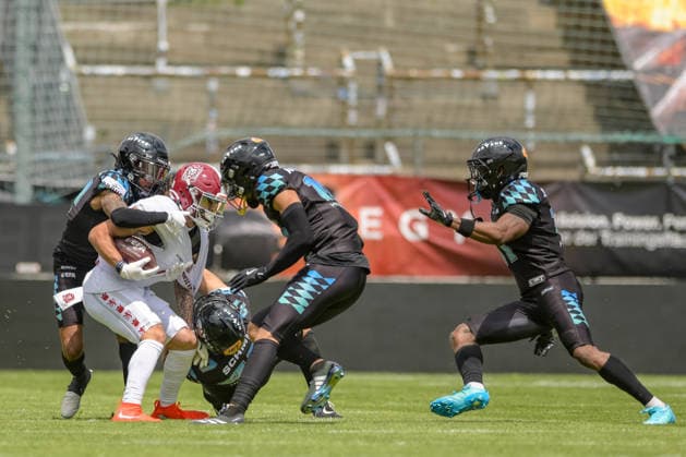 William Patterson (Prague Lions, 02) gets tackled by Ravens gang, Munich Ravens vs Prague Lions, American Football, European Football Alliance, Week 5, 2026, 14.06.2026, Unterhaching uhlsport Sportpark Germany Copyright: xFootxBowlxPressexFotoxAgentur JUx