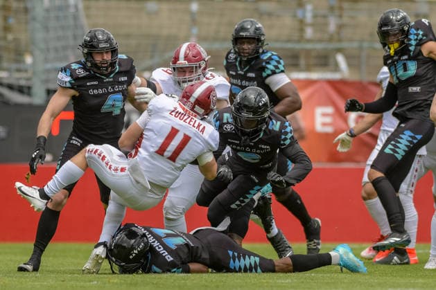Adam Zouzelka (Prague Lions, 11) got tackled by Ravens defence, Munich Ravens vs Prague Lions, American Football, European Football Alliance, Week 5, 2026, 14.06.2026, Unterhaching uhlsport Sportpark Germany Copyright: xFootxBowlxPressexFotoxAgentur JUx