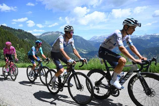 Tour Auvergne - Rhone-Alpes 2026 Stage 8 PLATEAU DE SOLAISON - BRISON, FRANCE - JUNE 14 : Garcia Pierna Raul (ESP) of Movistar Team, Uijtdebroeks Cian (BEL) of Movistar Team during stage 8 of the 78th edition of Tour Auvergne - Rhone-Alpes an UCI World Tour 2.UWT cycling road race stage for Men Elite of 120.1 km with start in Beaufort and finish in Plateau de Solaison - Brison on June 14, 2026 in Plateau de Solaison - Brison, France, 14 06 2026 ( Motordriver Guy De Vuyst - Plateau de Solaison - Brison France  Copyright: xVincentxKalutx