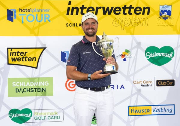 GOLF - Interwetten Open HAUS,AUSTRIA,14.JUN.26 - GOLF - HotelPlanner Tour, Interwetten Open, Golfclub Schladming. Image shows Filip Mruzek (CZE). Keywords: trophy.  GEPAxpictures xHaraldxSteiner