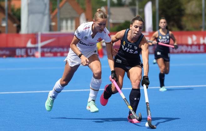 Belgium s Delphine Marien fights for the ball during a hockey game between Belgian national team, Nationalteam Red Panthers and Argentina, Sunday 14 June 2026 in Wavre, match 9 16 in the group stage of the women s FIH Pro League competition. VIRGINIExLEFOUR  x177624126x