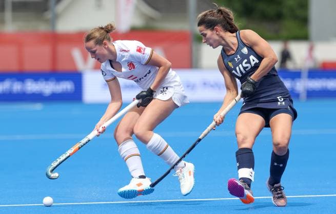 Belgium s Alix Marien fights for the ball during a hockey game between Belgian national team, Nationalteam Red Panthers and Argentina, Sunday 14 June 2026 in Wavre, match 9 16 in the group stage of the women s FIH Pro League competition. VIRGINIExLEFOUR  x177624222x