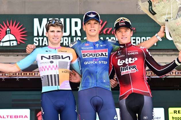 Muur Classic Geraardsbergen 2026 Cycling Race GERAARDSBERGEN, BELGIUM - JUNE 14 : Van Tricht Floris (BEL) of NSN Development Team, Magnier Paul (FRA) of Soudal Quick-Step and Berckmoes Jenno (BEL) of Lotto - Intermarche pictured during the podium ceremony of the 4th edition of Muur Classic Geraardsbergen an UCI Class 1.1 one day cycling road race for Men Elite of km with start in Geraardsbergen and finish in Geraardsbergen on June 14, 2026 in Geraardsbergen, Belgium, 14 06 2026 Geraardsbergen Belgium  Copyright: xPeterxDexVoechtx