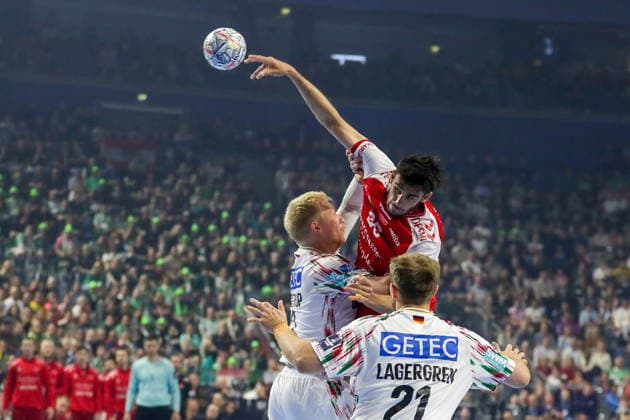 Cologne 14.06.2026. Pilka reczna EHF Liga Mistrzow sezon 2025 26 final4 mecz: Aalborg Handbold - SC Magdeburg --- Handball EHF Champions League season 2025 26 final4 match: Aalborg Handbold - SC Magdeburg nz Munk Marinus, Saugstrup Magnus Fot. Kacper Staniec NEWSPIX.PL --- newspix.pl 
