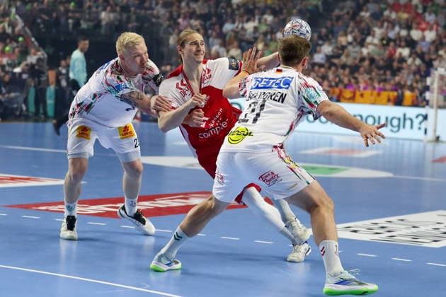 Cologne 14.06.2026. Pilka reczna EHF Liga Mistrzow sezon 2025 26 final4 mecz: Aalborg Handbold - SC Magdeburg --- Handball EHF Champions League season 2025 26 final4 match: Aalborg Handbold - SC Magdeburg nz Knorr Juri, Saugstrup Magnus Fot. Kacper Staniec NEWSPIX.PL --- newspix.pl 