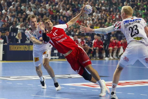Cologne 14.06.2026. Pilka reczna EHF Liga Mistrzow sezon 2025 26 final4 mecz: Aalborg Handbold - SC Magdeburg --- Handball EHF Champions League season 2025 26 final4 match: Aalborg Handbold - SC Magdeburg nz Hoxer Mads, Saugstrup Magnus Fot. Kacper Staniec NEWSPIX.PL --- newspix.pl 