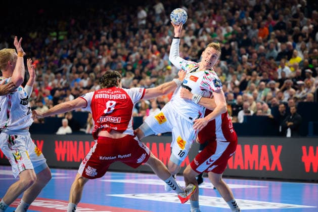 Koeln, Deutschland: Handball EHF CL Final 4 - Spiel Platz 3 - Aalborg Handbold - SC Magdeburg v.li. Magnus Saugstrup Jensen(SC Magdeburg), Vetle Ronningen (Aalborg), Gisli Thorgeir Kristjansson (SC Magdeburg) Koeln Lanxess Arena Nordrhein-Westfalen Deutschland