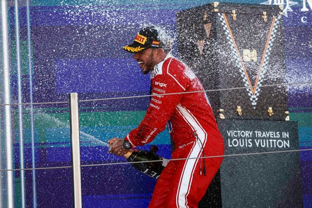 F1 - BARCELONA-CATALUNYA GRAND PRIX 2026 HAMILTON Lewis (gbr), Scuderia Ferrari SF-26, portrait celebration victory podium mechanic, mecanicien, mechanics champagne moet & chandon during the Formula 1 Barcelona-Catalunya Grand Prix 2026, 7th round of the 2026 Formula One World Championship, WM, Weltmeisterschaft from June 12 to 14, 2026 on the Circuit de Barcelona-Catalunya, in Montmelo, Spain - MontmeloSpain  Copyright: xXavixBonillax