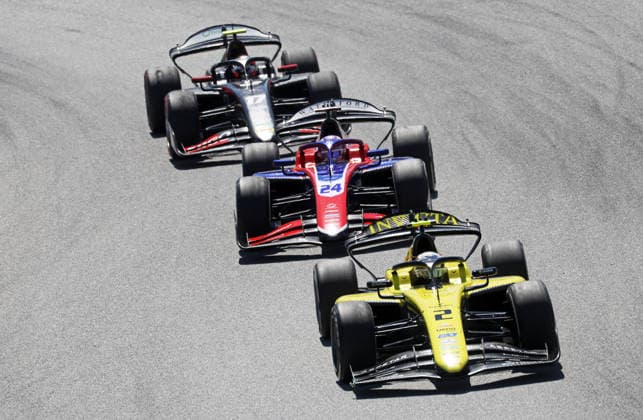 Formula 2 Championship - Round 5 Barcelona - Feature Race Joshua Durksen of Invicta Racing, Laurens van Hoepen of Trident, and Tasanapol Inthraphuvasak during the Formula 2 MSC Cruises Gran Premio de Barcelona-Catalunya Race at Barcelona-Catalunya Circuit in Barcelona, Spain, on June 14, 2026. Barcelona Barcelona Spain  Copyright: xUrbanandsportx originalFilename:urbanandsport-formula2260614_npyp2.jpg