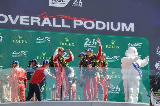 24 HEURES DU MANS 2026 - PODIUM 07 CONWAY Mike (gbr), KOBAYASHI Kamui (jpn), DE VRIES Nyck (nld), Toyota Racing, Toyota TR010 Hybrid 07, Hypercar, podium, during the podium of the 24 Hours of Le Mans 2026, 3rd round of the 2026 FIA World Endurance Championship, on June 14, 2026 on the Circuit des 24 Heures du Mans in Le Mans, France - Le MansFrance  Copyright: xFREDERICxLExFLOCxHx