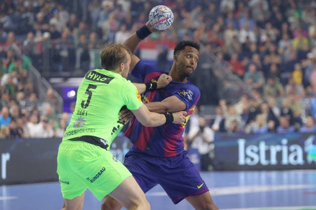 14.06.2026, xtgx, Handball, EHF Champions League Finale, FC Barcelona, Barca - Füchse Berlin v.l. Max Darj (Berlin, 5), Timothey N guessan (N guessan, Barcelona, 19) Zweikampf, Duell, Kampf, tackle Koeln