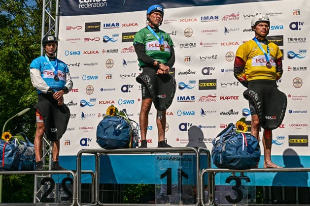 ICF Canoe Slalom World Cup - 14.06.2026, Eis Kanal, Augsburg Winner Men™s Kayak Corss from left: 2nd place David Llorente (ESP) , 1st place Joseph Clarke (GBR) , 3rd place Gabriel de Coster (BEL), Augsburg, 14.06.2026 - Canoe World Cup, Augsburg, Eis Kanal