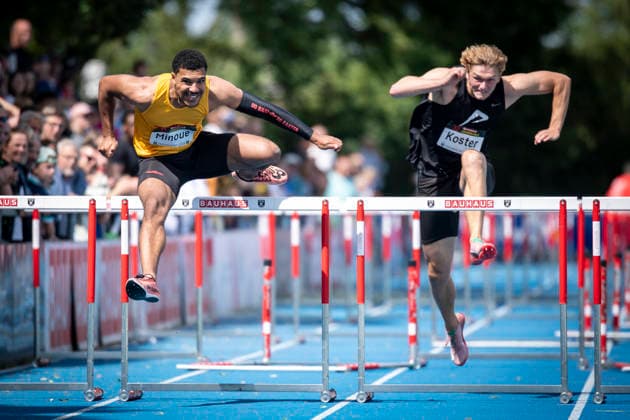 MANNHEIM, GERMANY - JUNE 14, 2026 : Gregory Minoue (GER Tracksrunner Bonn), Timme Koster (NED Netherlands) competing in the men’s 110m hurdles during the Elite Meeting at Michael-Hoffmann-Stadion on June 14, 2026 in Mannheim, Germany. Baden-Wuerttemberg Germany Copyright: xAxelxKohringx