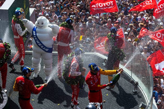 24 HEURES DU MANS 2026 - PODIUM 07 CONWAY Mike (gbr), KOBAYASHI Kamui (jpn), DE VRIES Nyck (nld), Toyota Racing, Toyota TR010 Hybrid 07, Hypercar, 20 FRIJNS Robin (nld), RAST RenÃ (ger), VAN DER LINDE Sheldon (zaf), BMW M Team WRT, BMW M Hybrid V8 20, Hypercar, 08 BUEMI SÃ bastien (swi), HARTLEY Brendon (nzl), HIRAKAWA Ryo (jpn), Toyota Racing, Toyota TR010 Hybrid 08, Hypercar, portrait during the podium of the 24 Hours of Le Mans 2026, 3rd round of the 2026 FIA World Endurance Championship, on June 14, 2026 on the Circuit des 24 Heures du Mans in Le Mans, France -  Copyright: xGERMAINxHAZARDx