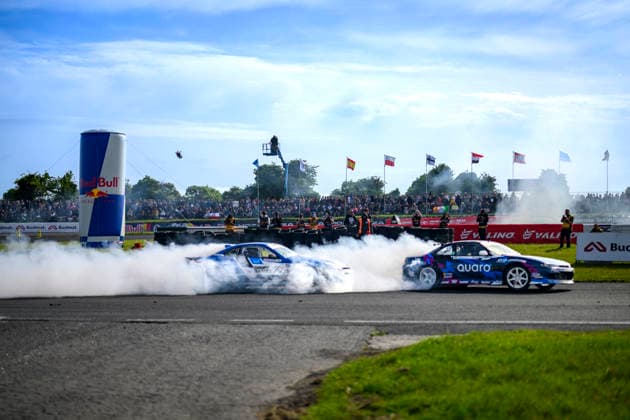 REPRO FREE *PRESS RELEASE NO REPRODUCTION FEE* EDITORIAL USE ONLY Red Bull Drift Masters, Mondello Park 14 6 2026 Thousands turned out for Red Bull Drift Masters and Red Bull Drift Pursuit at Mondello Park this weekend, with fans treated to two days of tyre-smoking drifting action. Conor Shanahan finished in the Top 32 of Red Bull Drift Masters, leaving the Cork driver second overall in the championship standings following the Irish round. Red Bull Drift Pursuit also featured as part of the weekend, with the top four drivers earning wildcard entries into Drift Masters qualifying alongside some of the Ä™s biggest names. Pictured is a view of the Red Bull Drift Masters A view of the Red Bull Drift Masters 14 6 2026  Copyright: x INPHO RedxBullxContentxPool MihaixStetcux MS_20260614_RED_BULL_DRIFT_MASTERS_5530