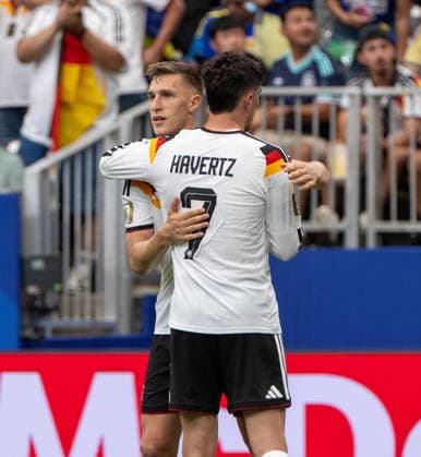 Fußball, Herren, FIFA World Cup, WM, Weltmeisterschaft, Fussball 2026 in Mexiko, Kanada und USA, Spiel in Houston (Gruppe E, 1. Spieltag), Deutschland - Curacao, v. l. Nico Schlotterbeck (Deutschland), Kai Havertz (Deutschland), Jubel nach Tor zum 3:1, 14.06. 2026,