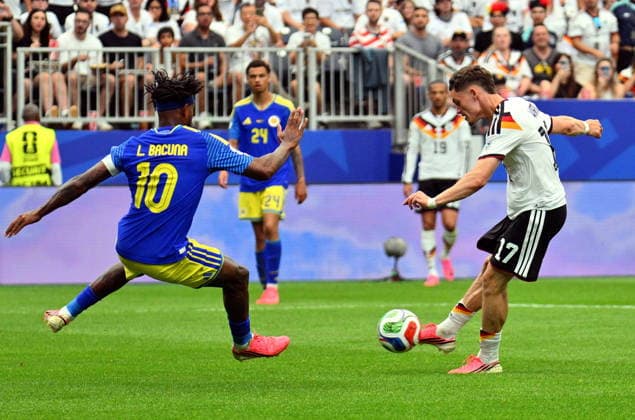 FIFA World Cup, WM, Weltmeisterschaft, Fussball 2026 - Group E - Germany vs Curacao Florian Wirtz of Germany (R) takes a shot on goal during the FIFA World Cup 2026 group stage match Germany against Curacao, in Houston, USA, 14 June 2026. HOUSTON United States  Copyright: xSAMxWASSONx