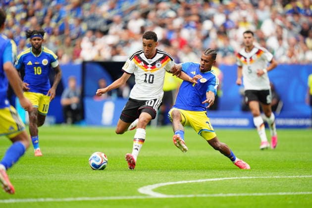 Germany v Curacao - FIFA World Cup, WM, Weltmeisterschaft, Fussball 2026 - Group E HOUSTON, UNITED STATES - JUNE 14: Jamal Musiala of Germany in action against Juninho Bacuna of Curacao during the 2026 FIFA World Cup First Stage Group E match between Germany and Curacao at NRG Stadium (Houston Stadium) in Houston, Texas, United States on June 14, 2026. Hakan Akgun Anadolu Texas United States. Editorial use only. Please get in touch for any other usage.  Copyright: x2026xAnadoluxHakanxAkgunx