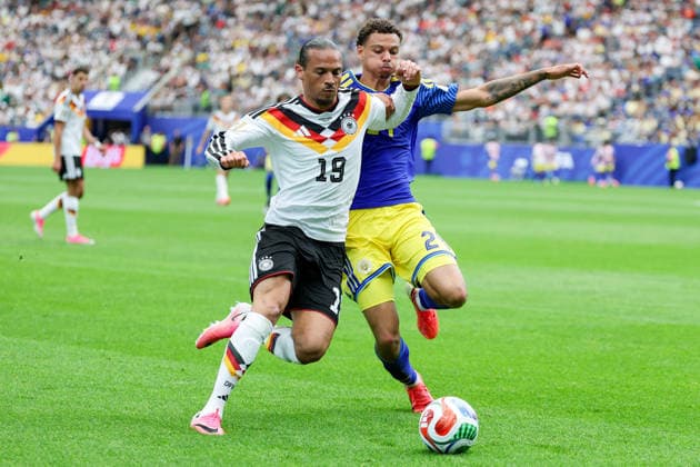 Leroy Sane (Germany) und Deveron Fonville (Curacao) battle for the ball during the FIFA World Cup, WM, Weltmeisterschaft, Fussball 2026 Group E match between Germany and Curacao at Houston Stadium on June 14, 2026 in Houston, United States. (Photo by Torbjorn Tande DeFodi Images) -