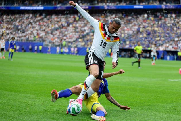 Leroy Sane (Germany) und Deveron Fonville (Curacao) battle for the ball during the FIFA World Cup, WM, Weltmeisterschaft, Fussball 2026 Group E match between Germany and Curacao at Houston Stadium on June 14, 2026 in Houston, United States. (Photo by Torbjorn Tande DeFodi Images) -