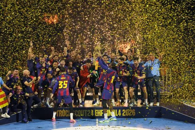 Siegerehrung, Domen MAKUC FC Barcelona, Barca Barca, 35) und Dika MEM (FC Barcelona Barca, 10) mit dem Pokal, Ceremony, Cup, Trophy, Jubel, Freude, Leidenschaft, Erfolg, Emotion, Begeisterung, positive Emotionen GER, FC Barcelona Barca vs. Fuechse Berlin, Handball, TruckScout24 EHF FINAL4 2026, Finale, Spielzeit 2025 2026, 14.06.2026, GER, FC Barcelona Barca vs. Fuechse Berlin, Handball, TruckScout24 EHF FINAL4 2026, Finale, Spielzeit 2025 2026, 14.06.2026, Koeln
