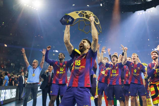 Blaz JANC FC Barcelona, Barca Barca, 18) mit dem Pokal, Siegerehrung Barca, Ceremony, Cup, Trophy, Jubel, Freude, Leidenschaft, Erfolg, Emotion, Begeisterung, positive Emotionen GER, FC Barcelona Barca vs. Fuechse Berlin, Handball, TruckScout24 EHF FINAL4 2026, Finale, Spielzeit 2025 2026, 14.06.2026, GER, FC Barcelona Barca vs. Fuechse Berlin, Handball, TruckScout24 EHF FINAL4 2026, Finale, Spielzeit 2025 2026, 14.06.2026, Koeln
