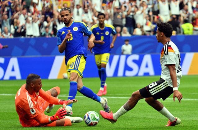 FIFA World Cup, WM, Weltmeisterschaft, Fussball 2026 - Group E - Germany vs Curacao Goalkeeper Eloy Room of Curacao (L) and Nathaniel Brown of Germany (R) in action during the FIFA World Cup 2026 group stage match Germany against Curacao, in Houston, USA, 14 June 2026. HOUSTON United States  Copyright: xSAMxWASSONx